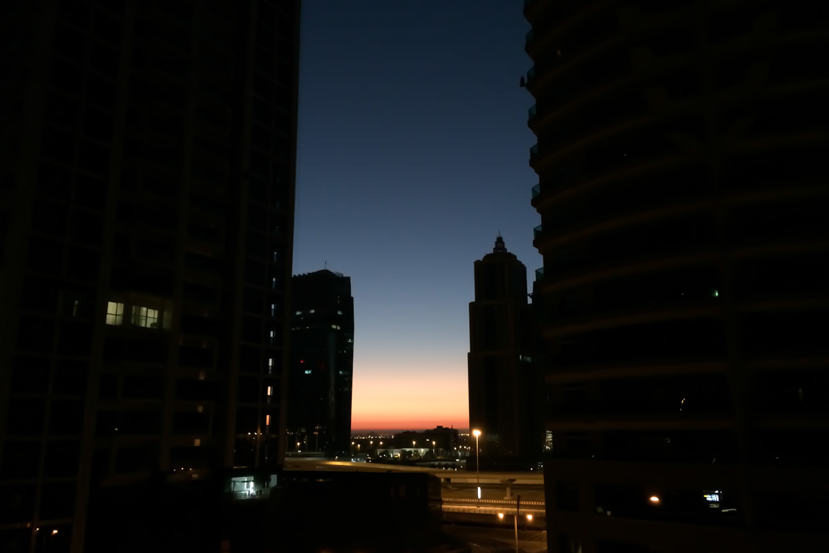 Dawn between buildings